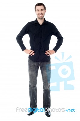 Handsome Guy With Hand On Hips Stock Photo