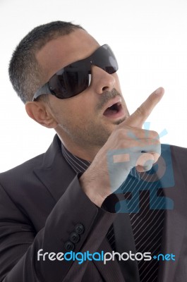 Handsome Male Pointing With Finger Stock Photo