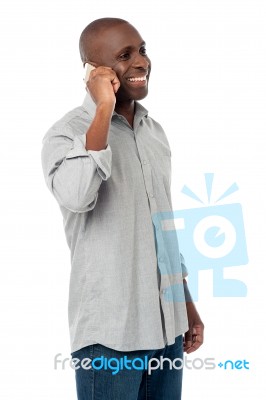 Handsome Male Talking On Phone Stock Photo