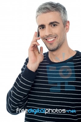 Handsome Man Communicating With Friend Stock Photo