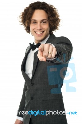 Handsome Man In Bow Tie Pointing You Out Stock Photo