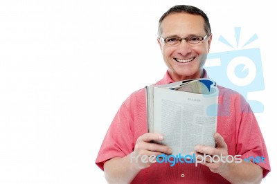 Handsome Man Reading Book Stock Photo