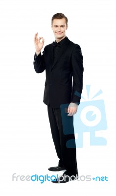 Handsome Man Showing OK Gesture Stock Photo