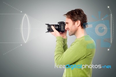 Handsome Man With The Camera Stock Photo