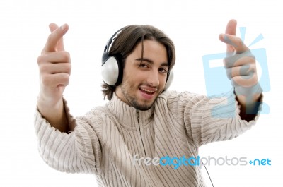 Handsome Model Listening Music Stock Photo