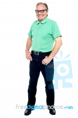 Handsome Senior Male Citizen Posing In Style Stock Photo