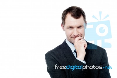 Handsome Thoughtful Businessman Stock Photo