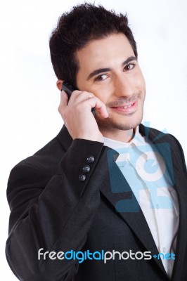 Handsome Young Business Man On A Phone Call Stock Photo