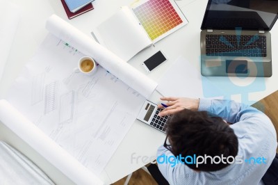 Handsome Young Businessman Working In The Office Stock Photo