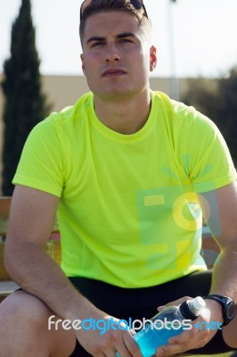 Handsome Young Man Drinking After Running Stock Photo