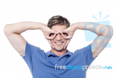 Handsome Young Man Gesturing And Smiling Stock Photo