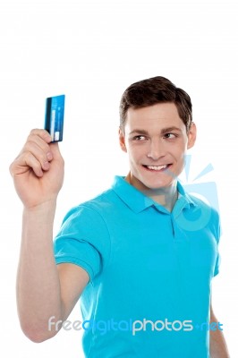 Handsome Young Man Holding Credit Card Stock Photo