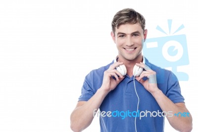 Handsome Young Man With Earphones Stock Photo