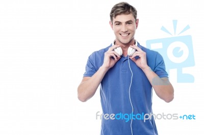 Handsome Young Man With Earphones Stock Photo