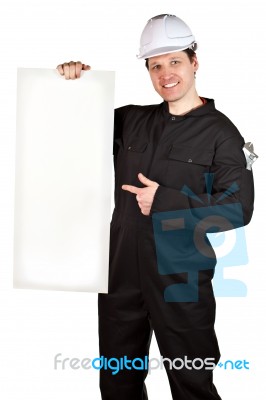 Handyman Wearing Uniform And Hardhat Stock Photo