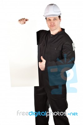 Handyman Wearing Uniform And Hardhat Stock Photo