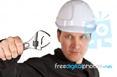 Handyman Wearing Uniform And Hardhat Stock Photo