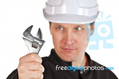 Handyman Wearing Uniform And Hardhat Stock Photo