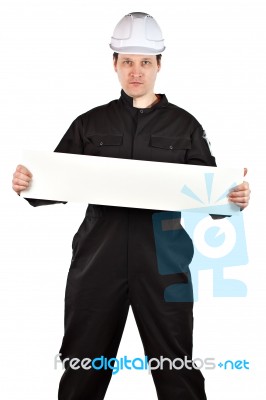 Handyman Wearing Uniform And Hardhat Stock Photo