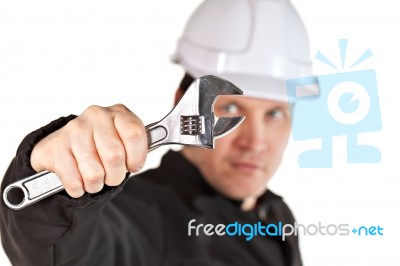 Handyman Wearing Uniform And Hardhat Stock Photo