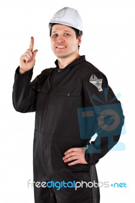 Handyman Wearing Uniform And Hardhat Stock Photo