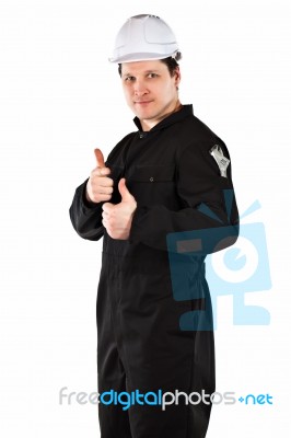 Handyman Wearing Uniform And Hardhat Stock Photo