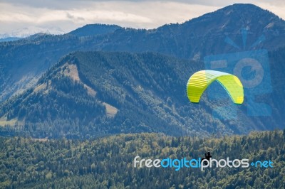 Hang-gliding Above The Countryside Around Zwölferhorn Mountain Stock Photo