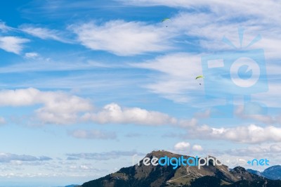 Hang-gliding Above The Countryside Around Zwölferhorn Mountain Stock Photo