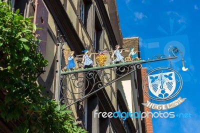 Hanging Sign In Riquewihr In Haut-rhin Alsace France Stock Photo