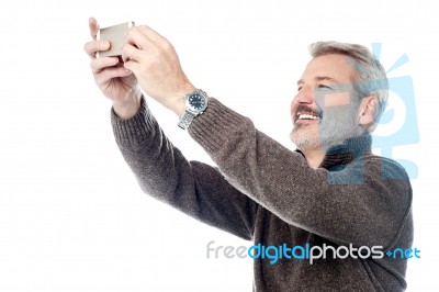 Happy Aged Man Taking Pictures Of Themselve Stock Photo