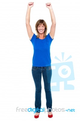 Happy And Cheerful Lady In Joyous Mood Stock Photo