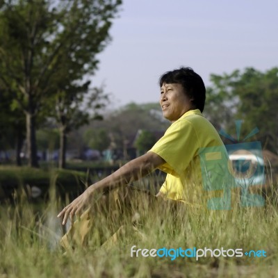 Happy Asian Middle-aged Man Stock Photo