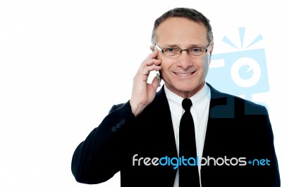 Happy Business Man Making A Call Stock Photo