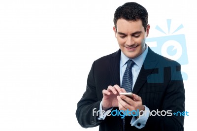 Happy Business Man Using  His Mobile Phone Stock Photo