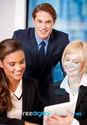 Happy Business Team At The Office Stock Photo