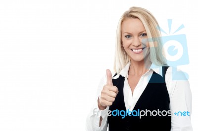 Happy Business Woman Giving Thumbs Up Stock Photo