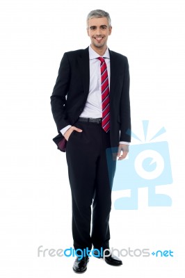 Happy Businessman Standing Isolated On White Stock Photo