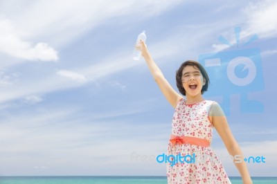 Happy Child Girls Feel Refreshed To Drink Water And Rejuvenate While Gestures Holding Plastic Bottle And Showing Victory Or Success Stock Photo