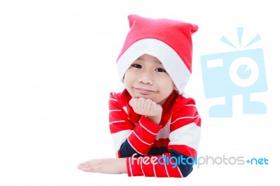 Happy Christmas Asian Boy Laying And Smiling Stock Photo