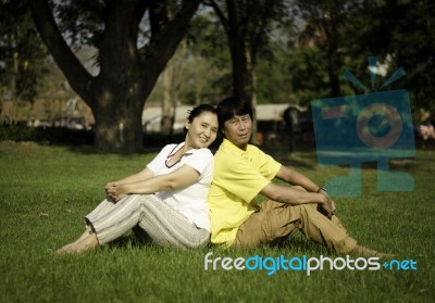 Happy Couple At Beautiful Park Stock Photo