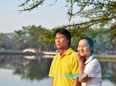 Happy Couple At Beautiful Park Stock Photo