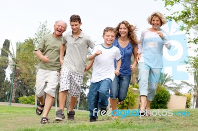 Happy Family Enjoying Outdoors Stock Photo