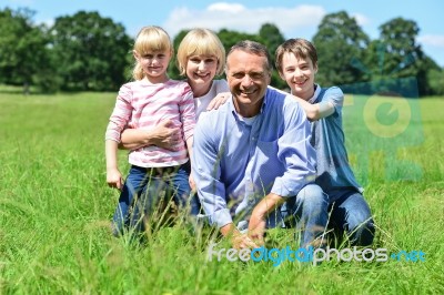 Happy Family Having Fun At Outdoors Stock Photo