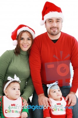 Happy Family In Christmas Costumes Stock Photo