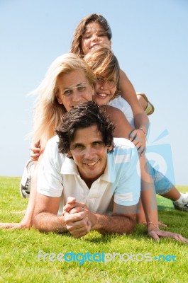 Happy family in garden Stock Photo