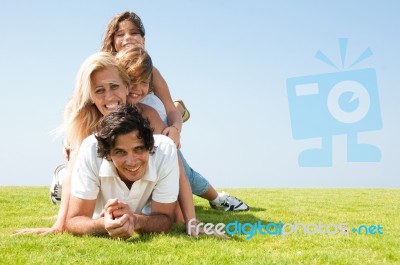 Happy family in garden Stock Photo