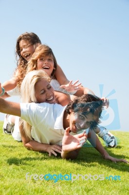 Happy Family in garden Stock Photo