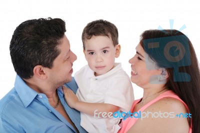 Happy Family: Mother, Father And Son.  Focus In The Boy Stock Photo