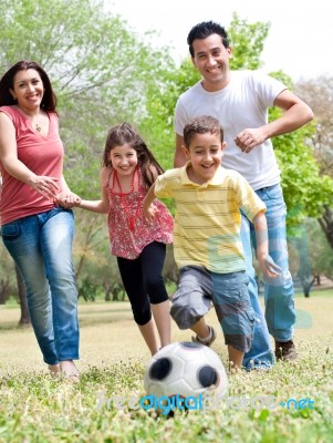 Happy Family Run Stock Photo