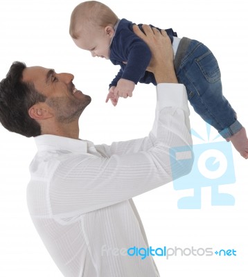 Happy Father Playing With Baby Boy Stock Photo